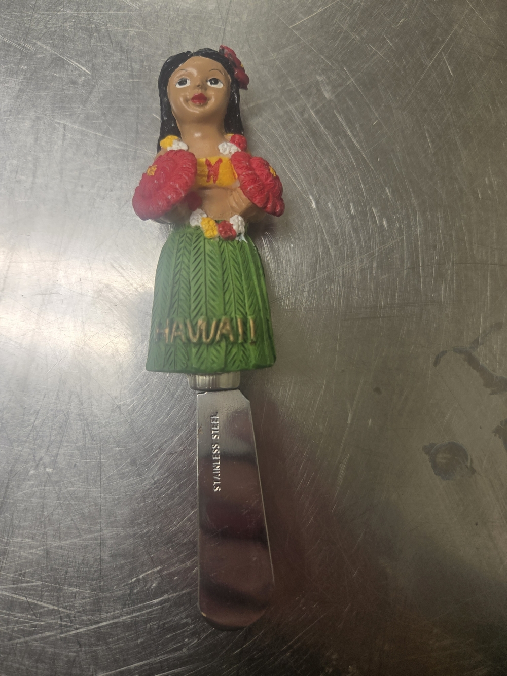 Collectible Hula Girl cheese spreader